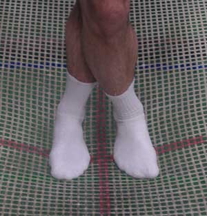 Füße in X Haltung